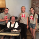 Dillon Hill, left, and other volunteers with Gamer’s Gift. Dominic Papa sits in front. Photo courtesy of Theresa Thorpe.